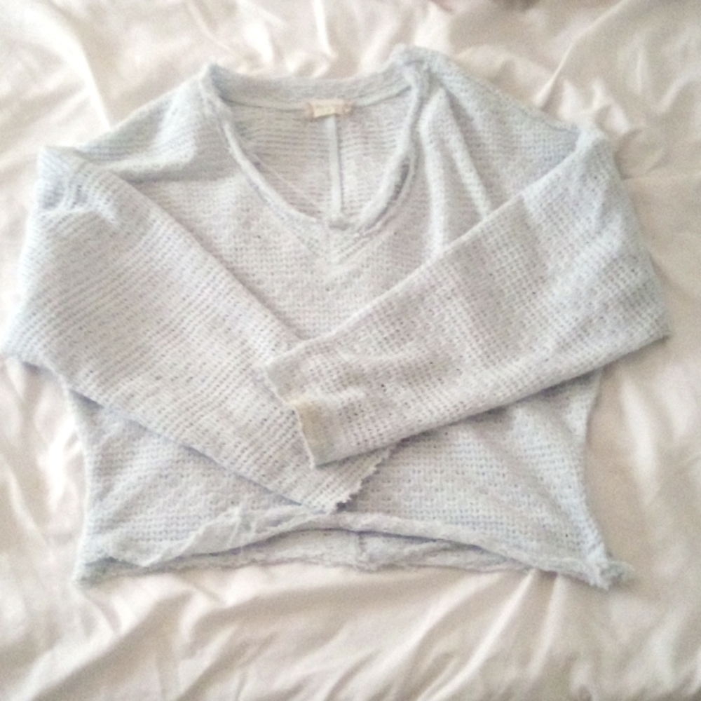 Baby blue cropped long sleeve skirt(xs) but it fit me and I'm a medium-large